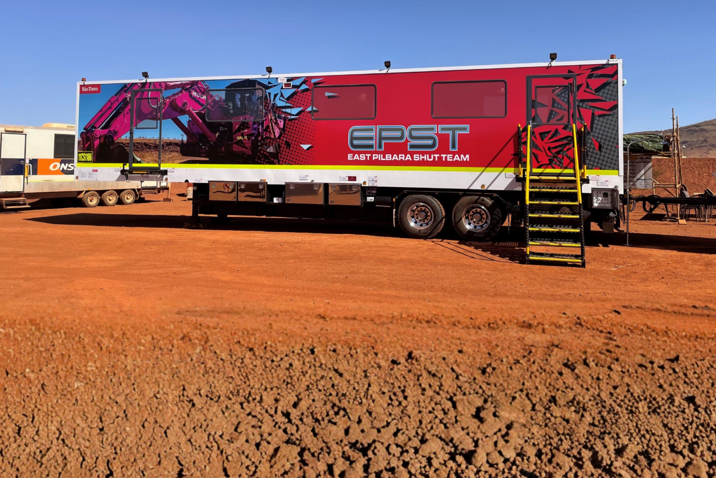 Shutdown trailer on cracked red earth